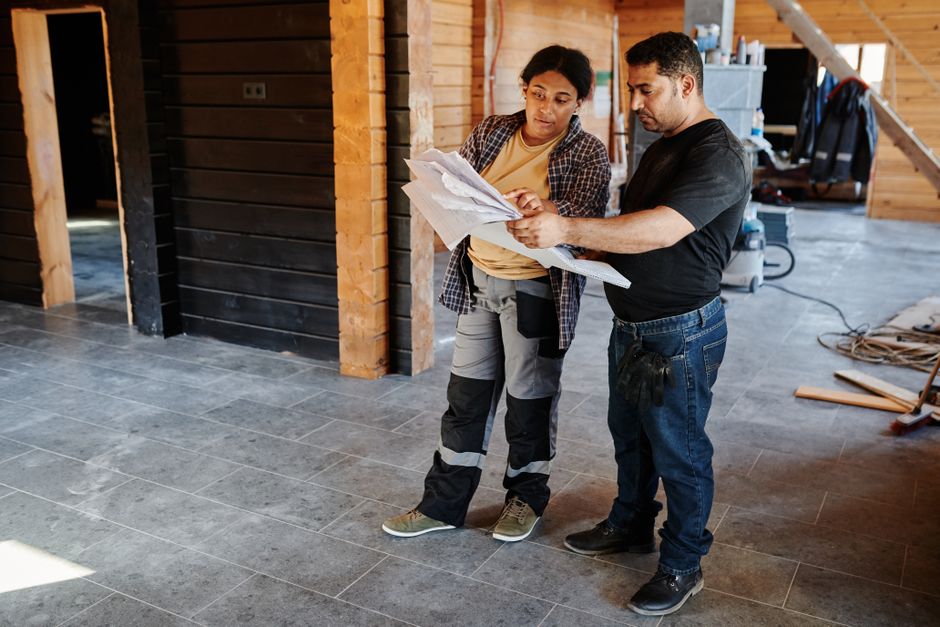 Professional contractor planning a bathroom renovation